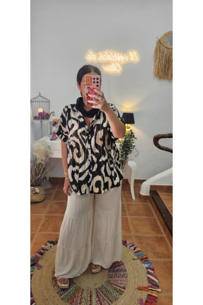 Blusa brillos crudo/negro