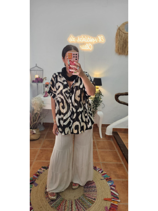 Blusa brillos crudo/negro