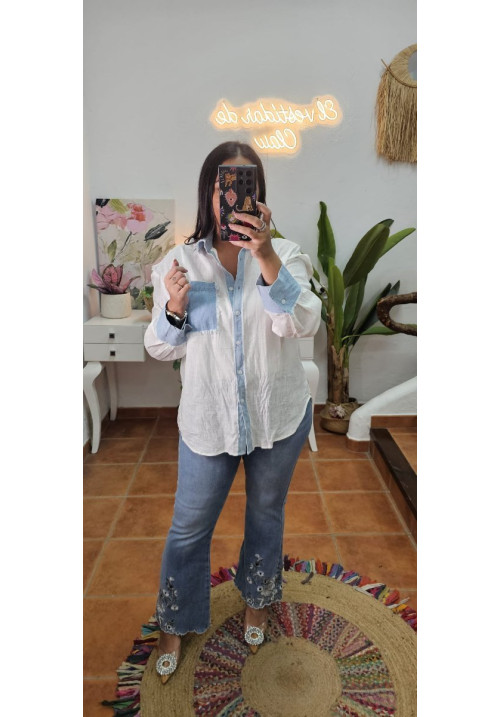 Jeans bajo flores bordados